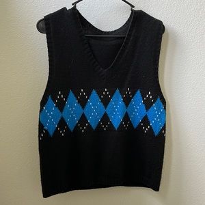 Black vest with blue diamonds